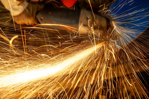 istock Grinding wheel grinding and cutting a pipe in a workshop. Motion. 2204768174
