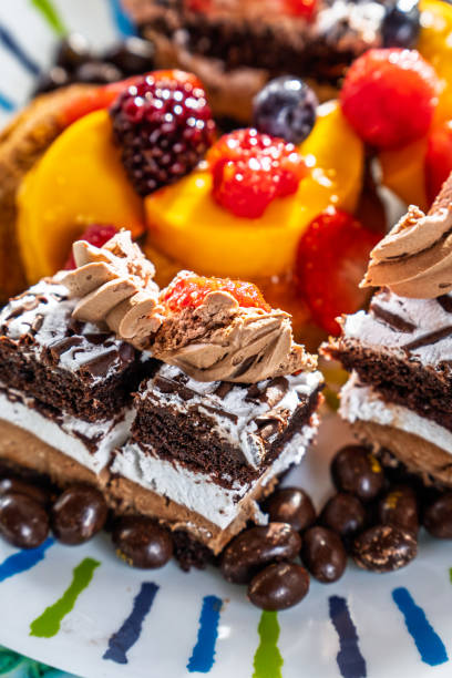 istock Delicious Chocolate Layered Cake with Fresh Fruits 2204773728