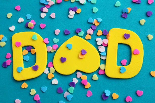 Word DAD and colorful hearts