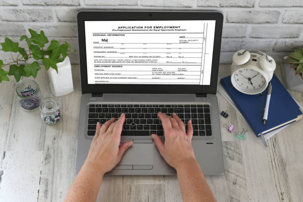 Filling out a job application for employment on a computer online