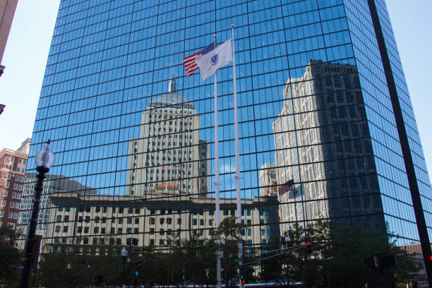 The Berkeley building skyscraper in berkeley street reflected on the John Hancock Tower sksycraper glass windows,, Boston, Massachusetts, USA