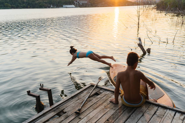 istock Peaceful Moments by the Lake: Paddleboard Adventure 2204786696