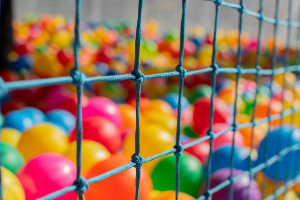 istock Colored balls in a ball park 2204788138