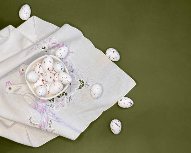 istock Assortment of white quail eggs. 2204796747