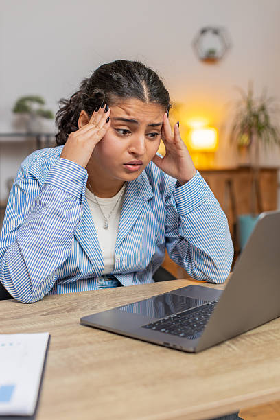 istock Upset furious woman freelancer using laptop working at home office having nervous breakdown at work 2204799397