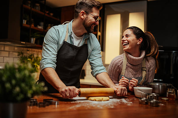 istock Couple enjoying baking together in cozy kitchen 2204807865
