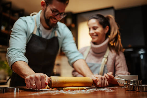 istock Couple enjoying baking together at home 2204807898