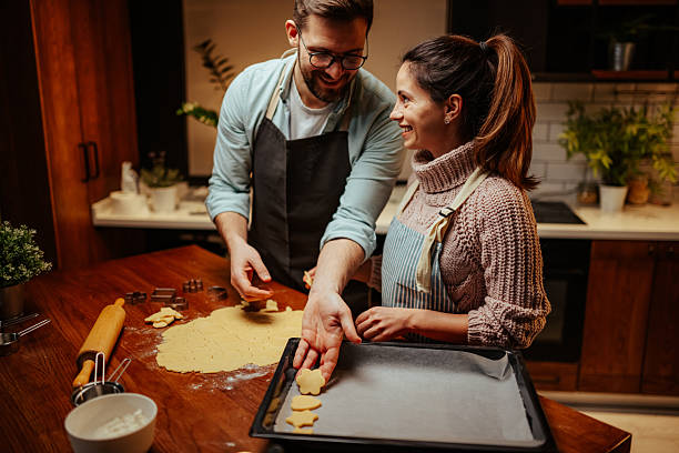 istock Couple enjoying quality time baking together 2204807942