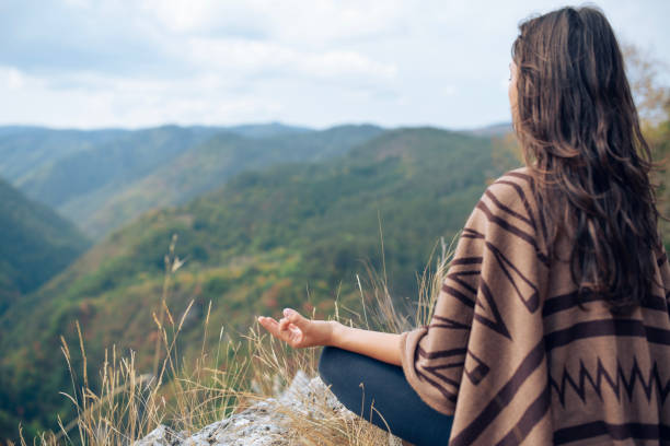 istock Meditation on a beautiful and peaceful spot in nature. 2204810001
