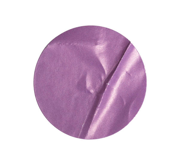 istock Crumpled purple round sticker paper with transparent background, creating a textured and vibrant visual element 2204810129
