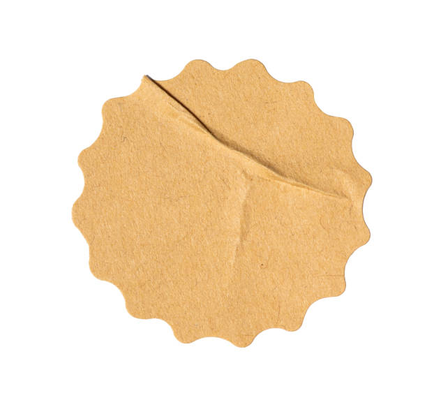 istock Recycled crumpled sticker paper cardboard price tag sticker with copy space, featuring a transparent background for easy integration into designs 2204810133