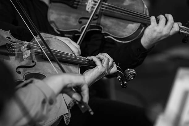 istock Hands of a musician playing the violin 2204810432