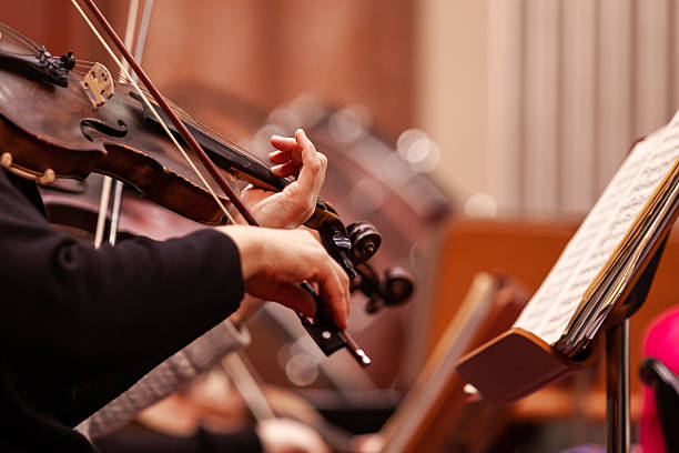 istock Hand of a musician playing the violin 2204810566