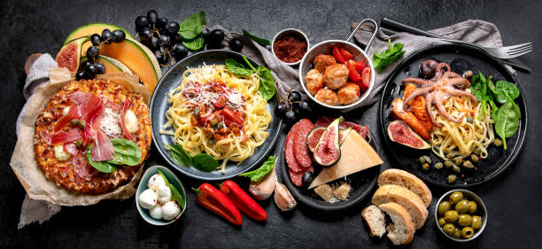 istock Dinner table of italian dishes. 2204826977