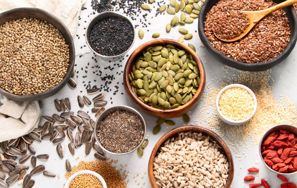 istock Variety of edible seeds. 2204827189