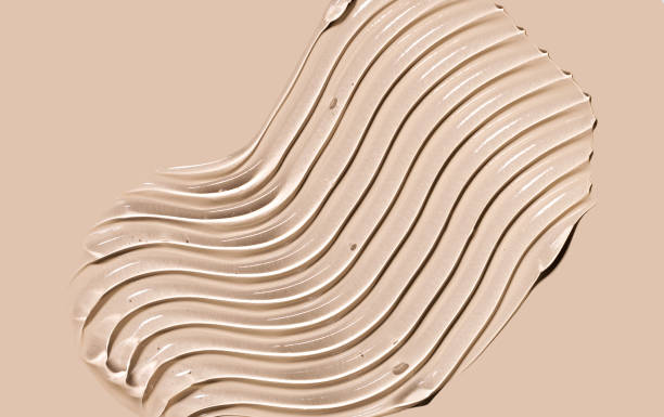 istock cosmetic texture gel essence smears on a beige background close-up 2204836554