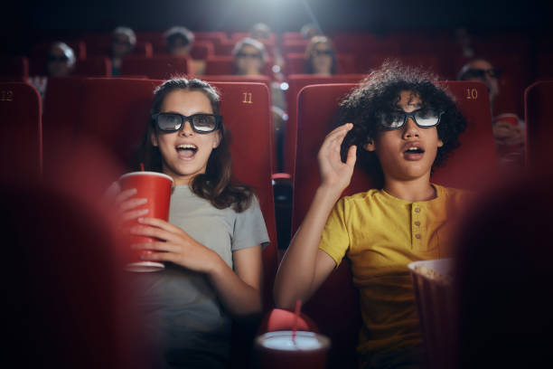 istock Watching 3d cartoon in cinema! 2204837555