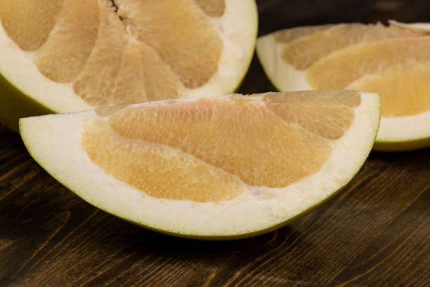 istock ripe pomelo with lots of pulp cut into pieces 2204839085