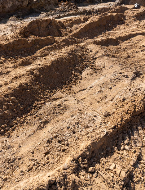 istock hole in the ground on the site of which a highway was started 2204839158