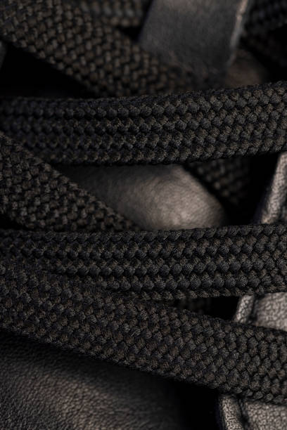 istock black synthetic laces for tying shoes 2204839163