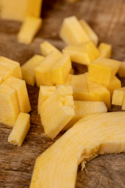 istock orange pumpkin fruit details cut into pieces for cooking 2204839205
