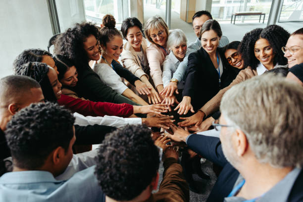 istock Group of diverse people with teamwork and inclusion at a conference setting 2204840146