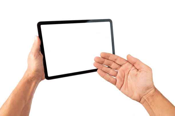 istock Male hands showing a digital tablet blanc screen isolated on white background 2204842924