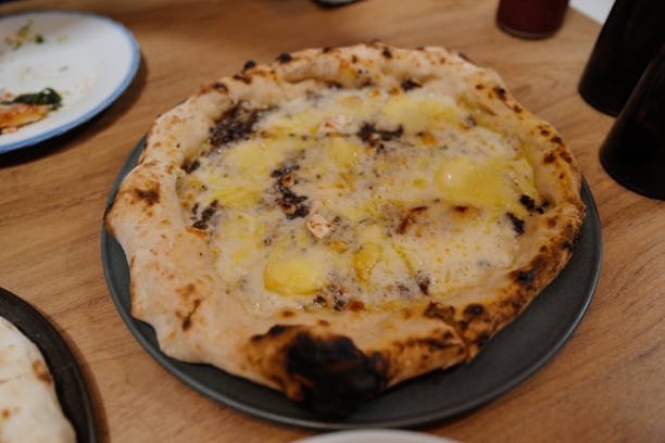 istock Close up four cheese pizza 2204843669