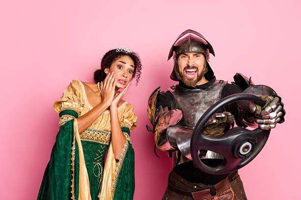 istock A funny medieval knight and an elegant princess posing together 2204851279