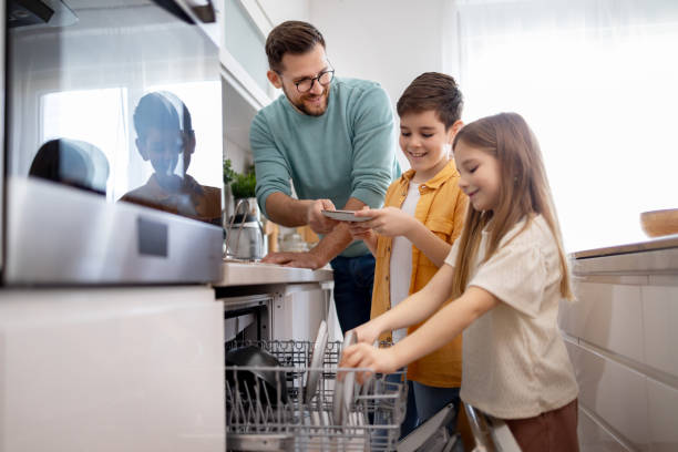 istock Sharing household chores in family kitchen 2204851638