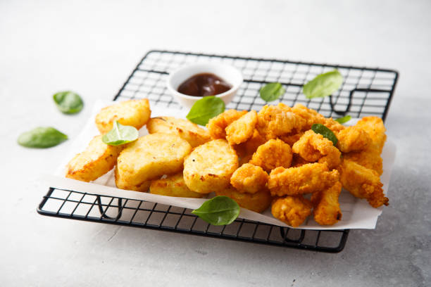 istock Chicken nuggets and potato hashbrowns 2204851770