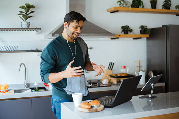 istock Casual Work-from-Home Lifestyle with Technology and Coffee 2204855190