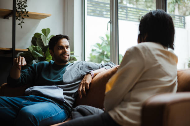 istock Asian Indian couple relax and talking to each other. 2204855312