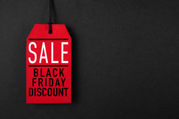 istock Special Black Friday Discount Price Tag on Black Background 2204855327