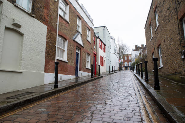 istock Wet cobblestone street in London 2204855458