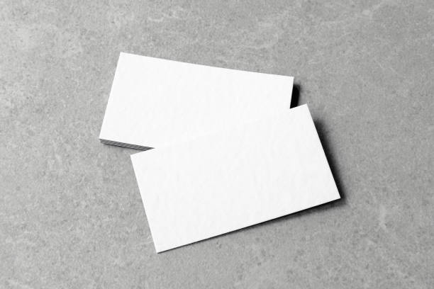 Business card on grey background.
