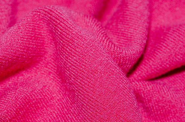 istock Bright Pink Knitted Fabric Texture Close Up 2204873273