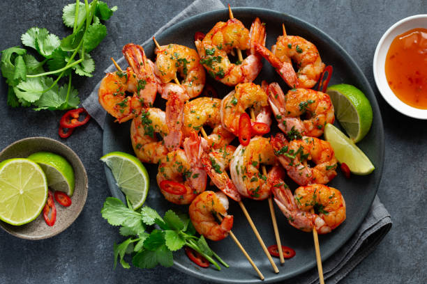 istock spicy grilled shrimps skewers 2204880510