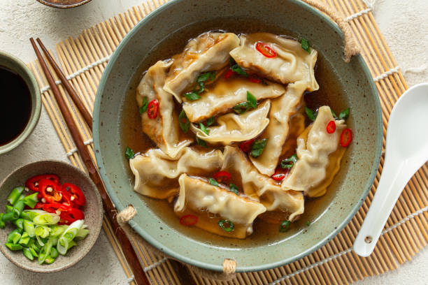 istock vegetarian gyoza dumplings soup 2204880527