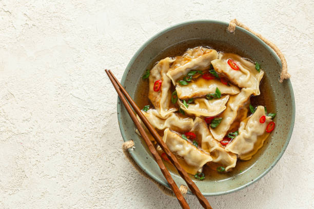 istock vegetarian gyoza dumplings soup 2204880537