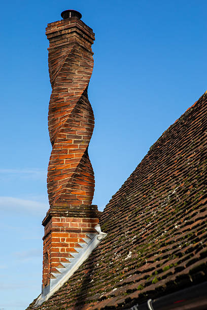 Old English house in brick and tile with attached dovecote. Sussex. England