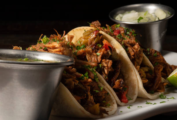 istock Carnitas Street Tacos Close Up 2204882360