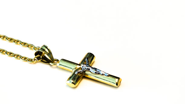 istock Catholic Christian concept with a gold cross necklace 2204882995