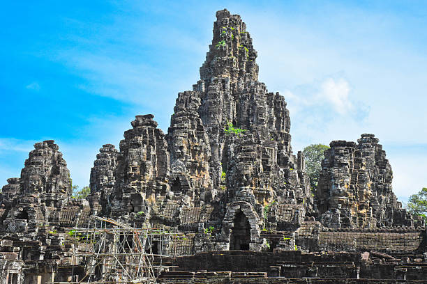 Stone face of the entrance at Jayavarman's capital, Angkor Thom, the last and most enduring capital city of the Khmer Empire, in Angkor, Cambodia.