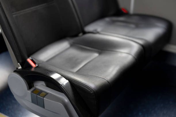 The black seats on the bus