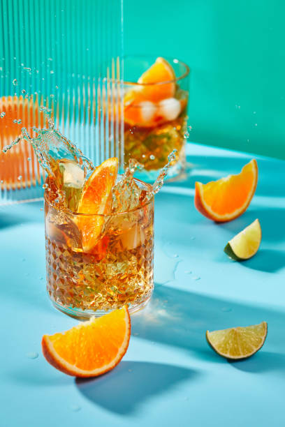 istock Summer drink with ice and oranges, lemonade, alcoholic or non-alcoholic cocktail. 2204892995