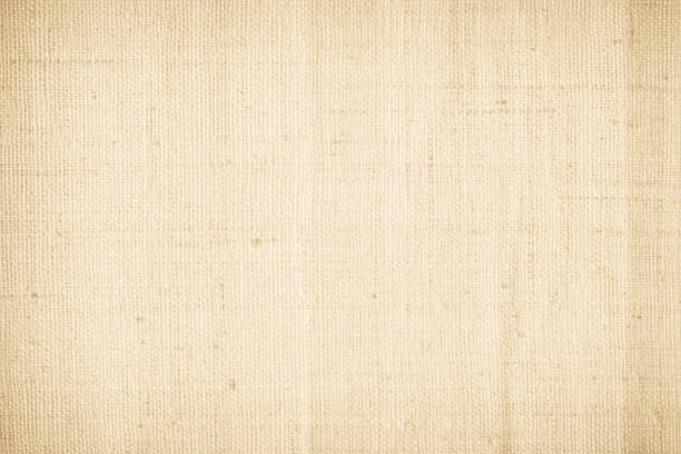 istock Brown sackcloth woven texture background in natural pattern. Jute hessian burlap, linen background in light beige cream color blank. Weaving canvas fiber line cotton cloth textured as organic. 2204893594
