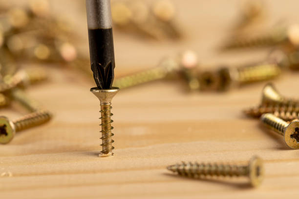 istock yellow metal self tapping screws for fastening are used in construction 2204894149
