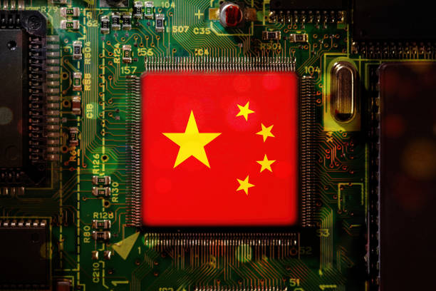 istock China flag on a CPU processor. GPU microchip on a motherboard. Chip manufacturer 2204894361