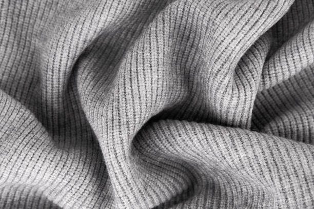 istock Wool knitwear Gray background Close-up 2204895190